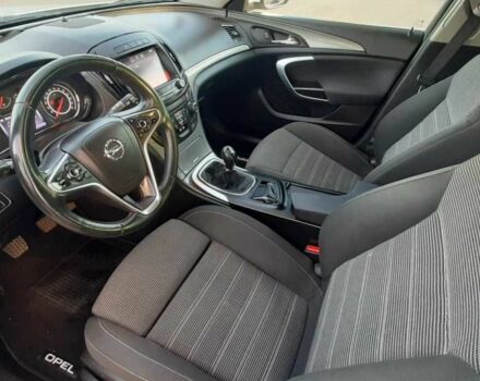 Белый Опель Инсигния, объемом двигателя 2 л и пробегом 220 тыс. км за 8600 $, фото 1 на Automoto.ua