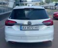 Белый Опель Инсигния, объемом двигателя 2 л и пробегом 297 тыс. км за 10700 $, фото 6 на Automoto.ua
