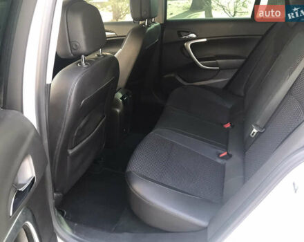 Білий Опель Інсігнія, об'ємом двигуна 2 л та пробігом 210 тис. км за 10800 $, фото 18 на Automoto.ua