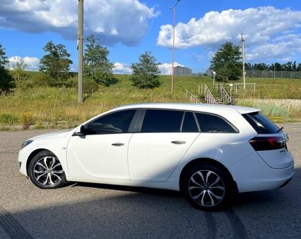 Белый Опель Инсигния, объемом двигателя 2 л и пробегом 246 тыс. км за 9100 $, фото 1 на Automoto.ua