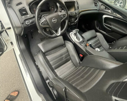 Білий Опель Інсігнія, об'ємом двигуна 2 л та пробігом 200 тис. км за 12500 $, фото 11 на Automoto.ua