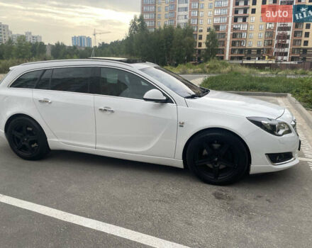 Білий Опель Інсігнія, об'ємом двигуна 2 л та пробігом 200 тис. км за 12500 $, фото 7 на Automoto.ua
