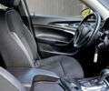 Белый Опель Инсигния, объемом двигателя 2 л и пробегом 244 тыс. км за 8900 $, фото 3 на Automoto.ua