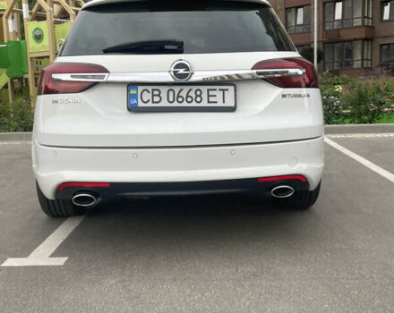 Білий Опель Інсігнія, об'ємом двигуна 2 л та пробігом 200 тис. км за 12500 $, фото 4 на Automoto.ua