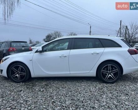 Белый Опель Инсигния, объемом двигателя 2 л и пробегом 288 тыс. км за 8800 $, фото 13 на Automoto.ua