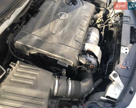 Білий Опель Інсігнія, об'ємом двигуна 2 л та пробігом 210 тис. км за 10800 $, фото 31 на Automoto.ua