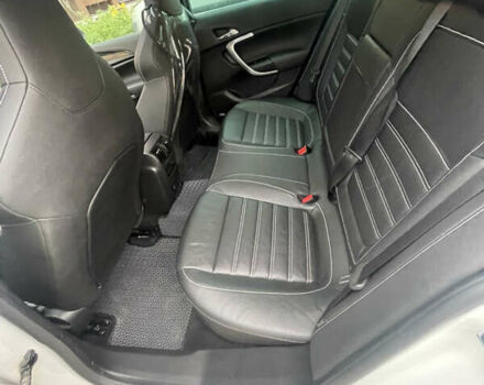 Білий Опель Інсігнія, об'ємом двигуна 2 л та пробігом 200 тис. км за 12500 $, фото 9 на Automoto.ua