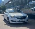 Белый Опель Инсигния, объемом двигателя 2 л и пробегом 297 тыс. км за 10700 $, фото 1 на Automoto.ua