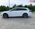 Білий Опель Інсігнія, об'ємом двигуна 1.96 л та пробігом 260 тис. км за 12699 $, фото 5 на Automoto.ua
