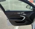 Білий Опель Інсігнія, об'ємом двигуна 1.96 л та пробігом 299 тис. км за 9500 $, фото 27 на Automoto.ua