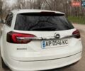 Белый Опель Инсигния, объемом двигателя 2 л и пробегом 224 тыс. км за 10600 $, фото 9 на Automoto.ua