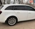 Белый Опель Инсигния, объемом двигателя 2 л и пробегом 224 тыс. км за 10600 $, фото 6 на Automoto.ua
