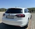 Білий Опель Інсігнія, об'ємом двигуна 2 л та пробігом 293 тис. км за 11500 $, фото 5 на Automoto.ua
