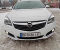 Білий Опель Інсігнія, об'ємом двигуна 2 л та пробігом 270 тис. км за 9850 $, фото 1 на Automoto.ua
