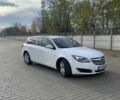 Білий Опель Інсігнія, об'ємом двигуна 2 л та пробігом 264 тис. км за 8022 $, фото 2 на Automoto.ua