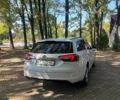 Білий Опель Інсігнія, об'ємом двигуна 2 л та пробігом 265 тис. км за 8200 $, фото 7 на Automoto.ua
