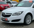 Білий Опель Інсігнія, об'ємом двигуна 2 л та пробігом 198 тис. км за 10490 $, фото 6 на Automoto.ua