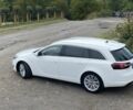 Білий Опель Інсігнія, об'ємом двигуна 2 л та пробігом 315 тис. км за 9800 $, фото 1 на Automoto.ua