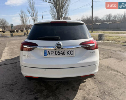 Білий Опель Інсігнія, об'ємом двигуна 2 л та пробігом 221 тис. км за 11600 $, фото 4 на Automoto.ua