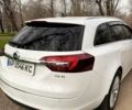 Білий Опель Інсігнія, об'ємом двигуна 2 л та пробігом 224 тис. км за 10999 $, фото 5 на Automoto.ua