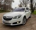 Білий Опель Інсігнія, об'ємом двигуна 2 л та пробігом 224 тис. км за 10999 $, фото 1 на Automoto.ua