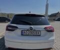 Білий Опель Інсігнія, об'ємом двигуна 2 л та пробігом 294 тис. км за 8544 $, фото 5 на Automoto.ua