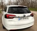 Білий Опель Інсігнія, об'ємом двигуна 2 л та пробігом 224 тис. км за 10999 $, фото 4 на Automoto.ua