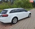 Білий Опель Інсігнія, об'ємом двигуна 1.96 л та пробігом 217 тис. км за 11000 $, фото 2 на Automoto.ua