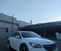 Белый Опель Инсигния, объемом двигателя 2 л и пробегом 230 тыс. км за 9500 $, фото 2 на Automoto.ua