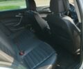 Білий Опель Інсігнія, об'ємом двигуна 2 л та пробігом 232 тис. км за 11000 $, фото 6 на Automoto.ua