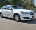 Белый Опель Инсигния, объемом двигателя 1.96 л и пробегом 205 тыс. км за 8599 $, фото 1 на Automoto.ua