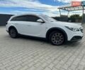 Белый Опель Инсигния, объемом двигателя 2 л и пробегом 207 тыс. км за 12000 $, фото 1 на Automoto.ua