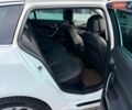 Білий Опель Інсігнія, об'ємом двигуна 1.96 л та пробігом 260 тис. км за 12699 $, фото 7 на Automoto.ua