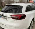 Белый Опель Инсигния, объемом двигателя 2 л и пробегом 224 тыс. км за 10600 $, фото 1 на Automoto.ua