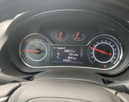 Білий Опель Інсігнія, об'ємом двигуна 2 л та пробігом 315 тис. км за 9800 $, фото 12 на Automoto.ua