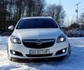 Білий Опель Інсігнія, об'ємом двигуна 2 л та пробігом 315 тис. км за 11200 $, фото 1 на Automoto.ua