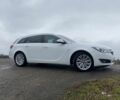Белый Опель Инсигния, объемом двигателя 2 л и пробегом 320 тыс. км за 9349 $, фото 2 на Automoto.ua