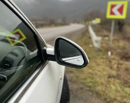 Белый Опель Инсигния, объемом двигателя 2 л и пробегом 320 тыс. км за 9349 $, фото 7 на Automoto.ua