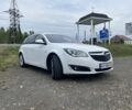 Білий Опель Інсігнія, об'ємом двигуна 2 л та пробігом 315 тис. км за 9800 $, фото 2 на Automoto.ua
