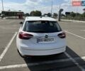 Білий Опель Інсігнія, об'ємом двигуна 1.96 л та пробігом 299 тис. км за 9500 $, фото 3 на Automoto.ua