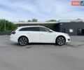 Білий Опель Інсігнія, об'ємом двигуна 1.96 л та пробігом 260 тис. км за 12699 $, фото 4 на Automoto.ua