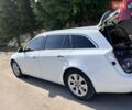 Білий Опель Інсігнія, об'ємом двигуна 1.96 л та пробігом 198 тис. км за 14800 $, фото 4 на Automoto.ua