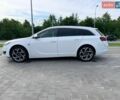 Білий Опель Інсігнія, об'ємом двигуна 1.96 л та пробігом 260 тис. км за 12699 $, фото 2 на Automoto.ua