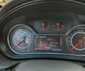 Білий Опель Інсігнія, об'ємом двигуна 1.96 л та пробігом 231 тис. км за 10800 $, фото 6 на Automoto.ua