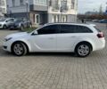 Белый Опель Инсигния, объемом двигателя 1.96 л и пробегом 264 тыс. км за 7970 $, фото 7 на Automoto.ua