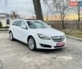 Белый Опель Инсигния, объемом двигателя 2 л и пробегом 248 тыс. км за 11200 $, фото 4 на Automoto.ua