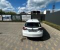 Білий Опель Інсігнія, об'ємом двигуна 1.96 л та пробігом 206 тис. км за 9000 $, фото 4 на Automoto.ua
