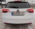 Білий Опель Інсігнія, об'ємом двигуна 2 л та пробігом 270 тис. км за 9850 $, фото 10 на Automoto.ua