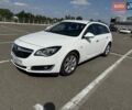 Белый Опель Инсигния, объемом двигателя 1.96 л и пробегом 295 тыс. км за 12000 $, фото 1 на Automoto.ua