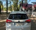 Білий Опель Інсігнія, об'ємом двигуна 2 л та пробігом 265 тис. км за 8200 $, фото 6 на Automoto.ua